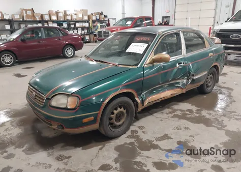 2001 Suzuki Esteem Gl/Glx/Glx+ из США, поврежденный, VIN JS2GB41S315207671